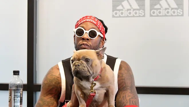 Rapper 2 Chainz and his dog Trappy
